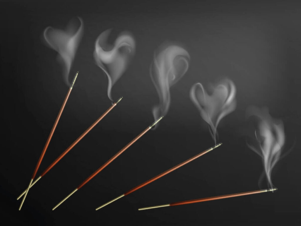 A floating array of incense sticks with wisps of smoke coming from each.
