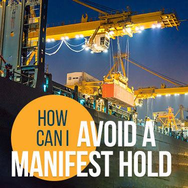 Manifest hold -A container is loaded onto a cargo ship