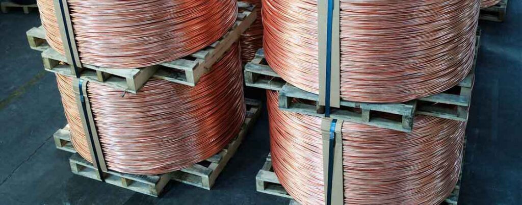 Copper wires rapped in circles and stacked on pallets