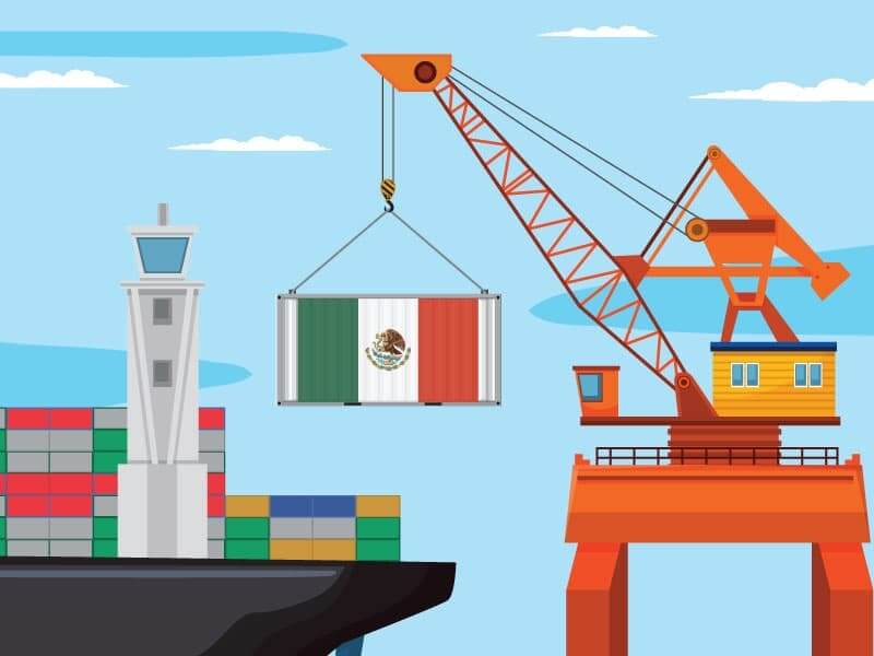 A crane loading a container with a Mexican flag on it onto a cargo ship