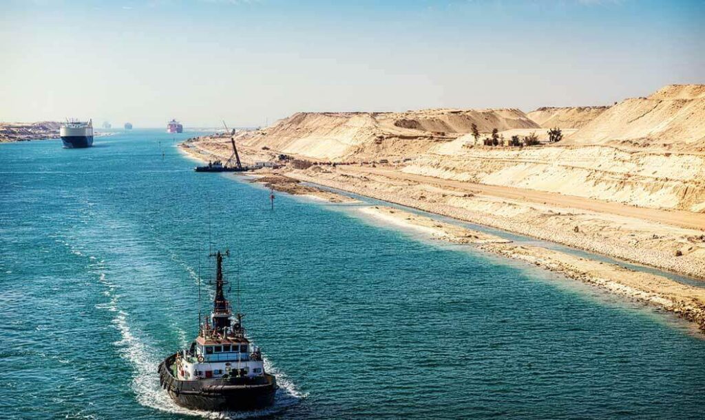 A tugboat moves along the Red Sea.