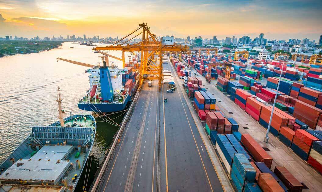 Container ship docked at a port terminal.