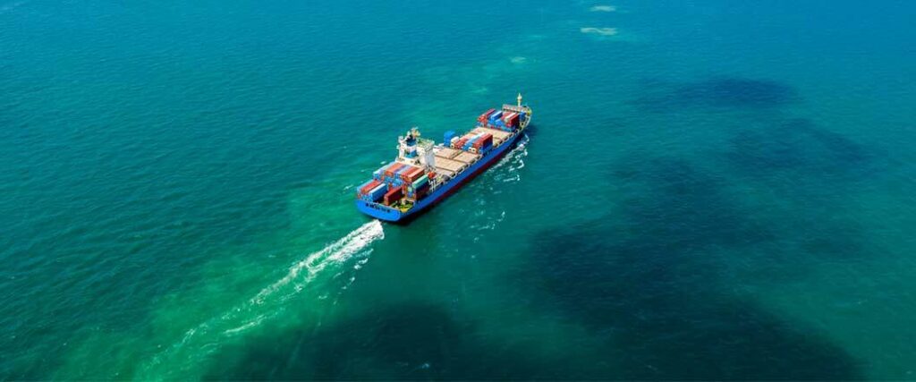 A container ship full of transit cargo arrives at a U.S. port after filing an ISF-5.