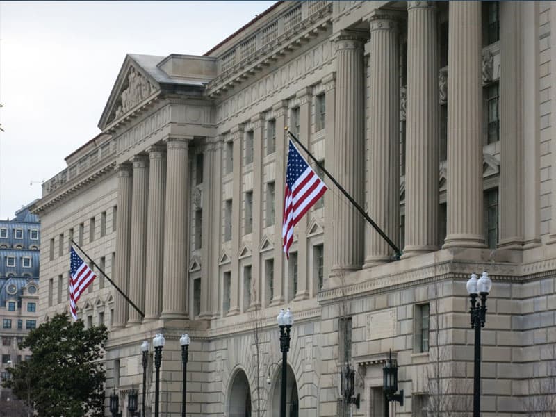 An image of the Herbert C. Hoover building, where the offices of the Department of Commerce are located.